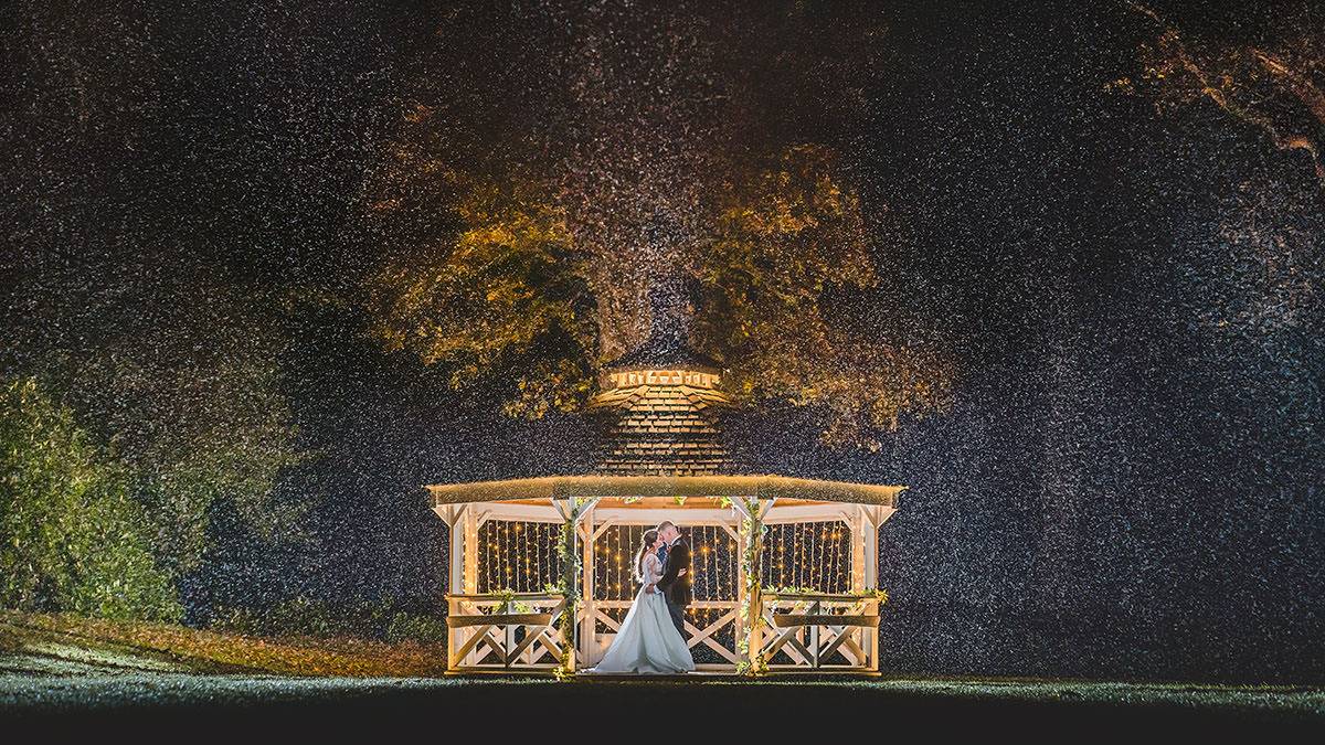Elopement wedding photography at Armathwaite Halll nighttime couple in the rain