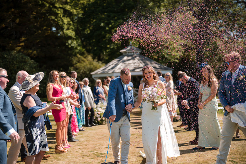Outdoor ceremony confetti moment at Armathwaite Hall
