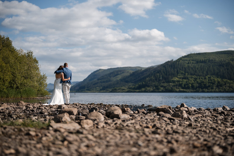 Wedding couple lakeshore portrait at Armathwaite Hall on Bassenthwaite Lake