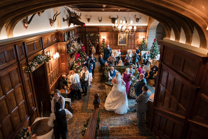 Drinks reception in the lounge at Christmas time at Armathwaite Hall