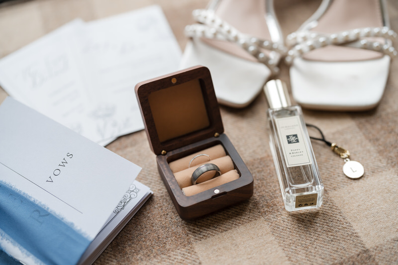 Wedding rings flat lay detail at Armathwaite Hall