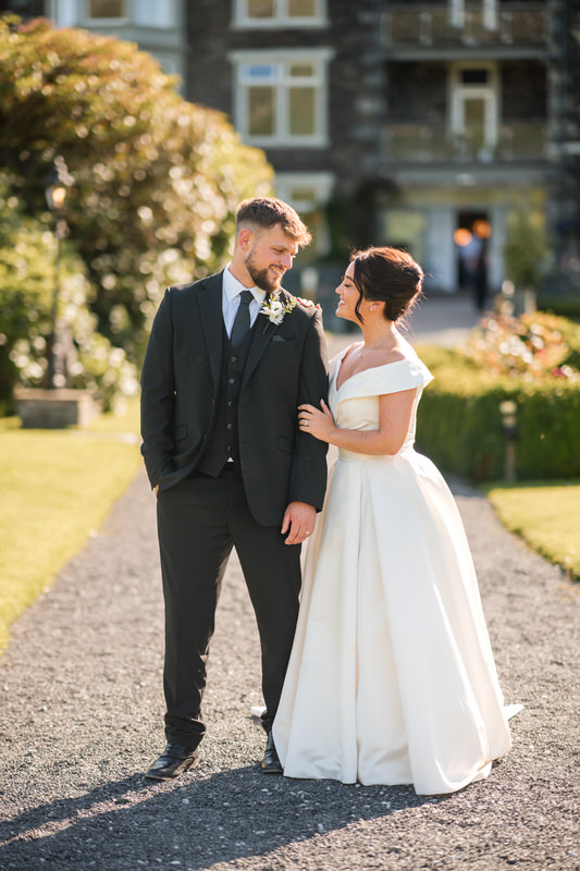 Wedding couple portrait in the hotel garden at Inn on the Lake