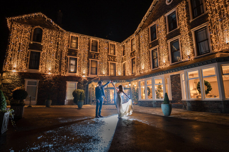 Inn on the Lake evening hotel exterior with wedding lights