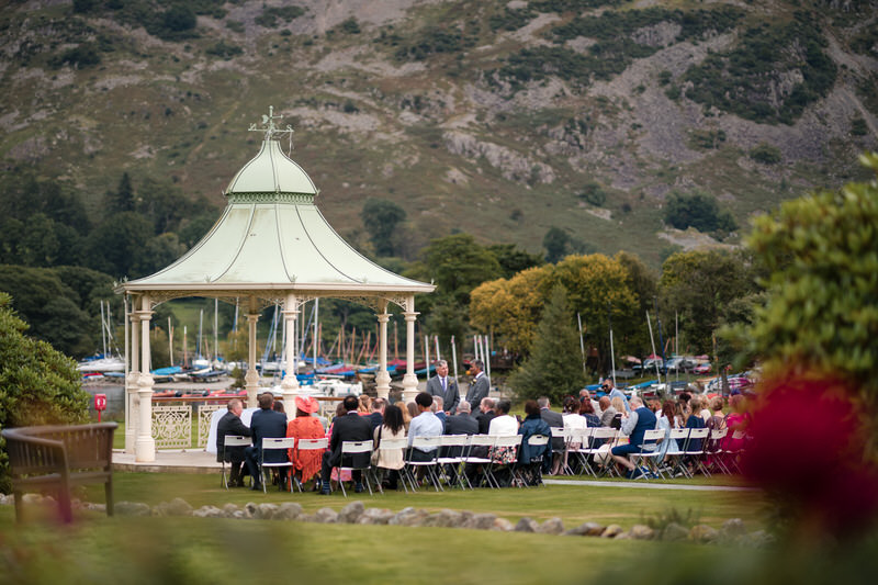 Wedding guests seated at the gazebo ceremony at Inn on the Lake with Ullswater view