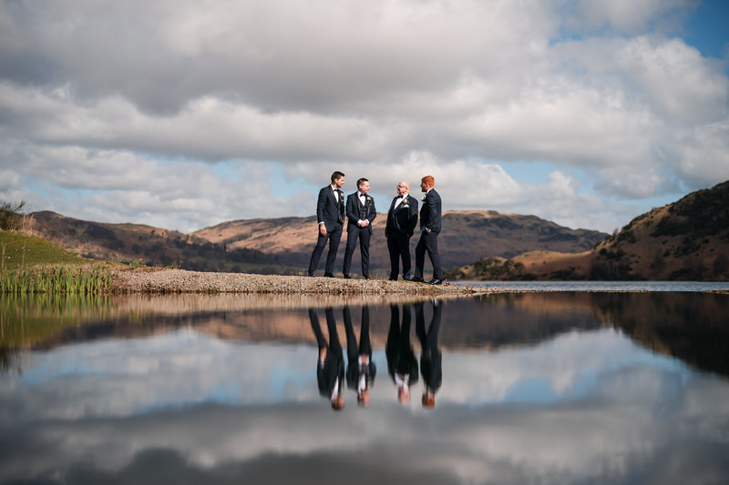 Groomsmen portrait with Ullswater reflection at Inn on the Lake