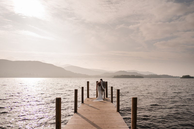 Wedding couple on the Derwentwater jetty near Lodore Falls Hotel