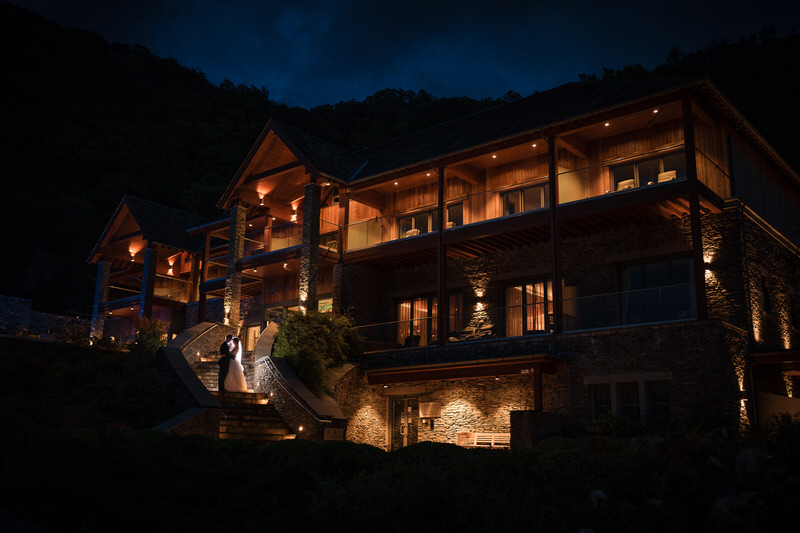 Lodore Falls Hotel illuminated at night