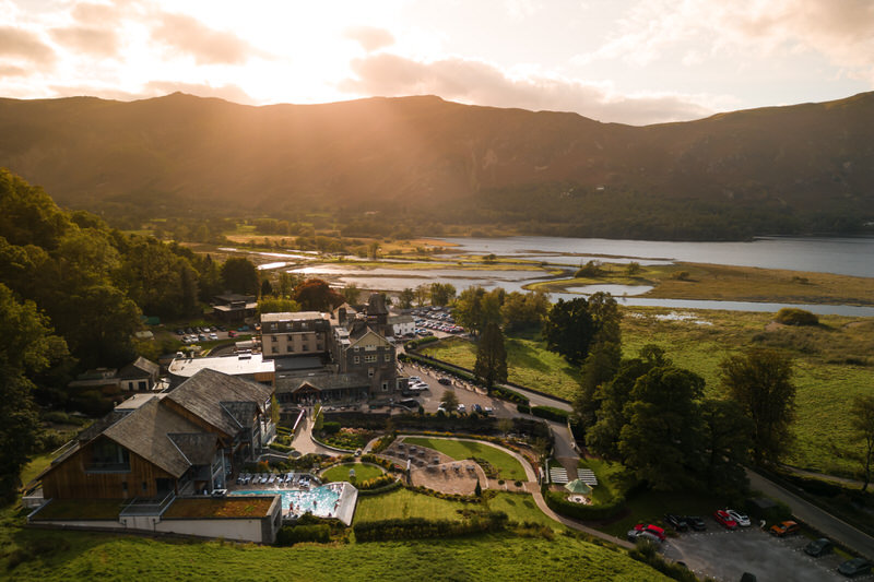 Golden hour aerial of Lodore Falls Hotel and Derwentwater