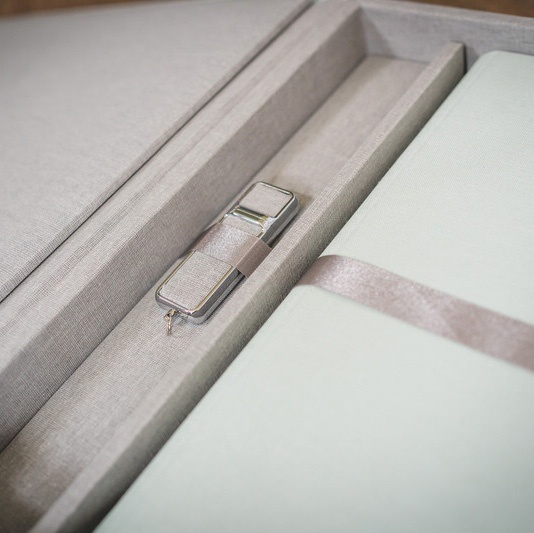 Wedding album and box set photographed together