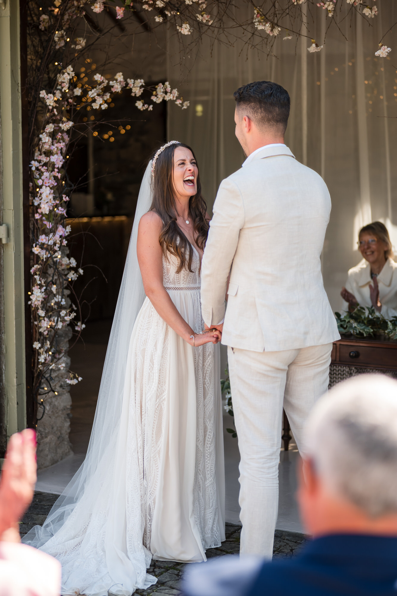 Bride and groom during an outdoor wedding ceremony at Cote How
