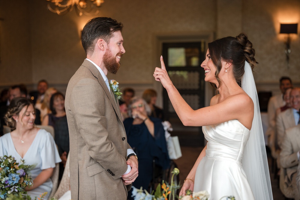 Chris Freer Photography capturing candid wedding moments during a ceremony