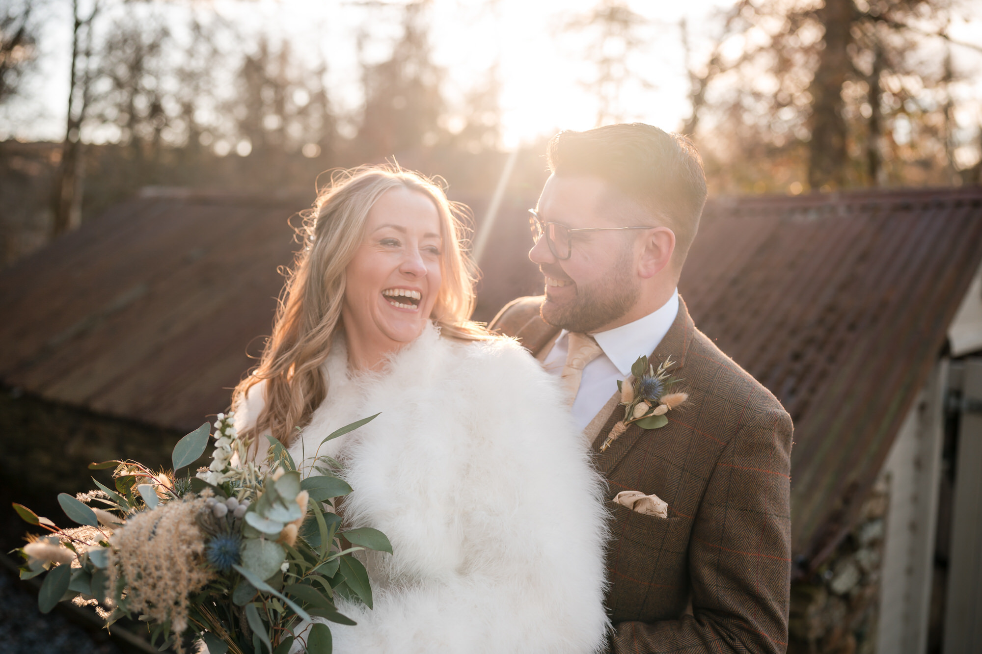 Golden hour wedding portrait of a couple at Gilpin Lake House