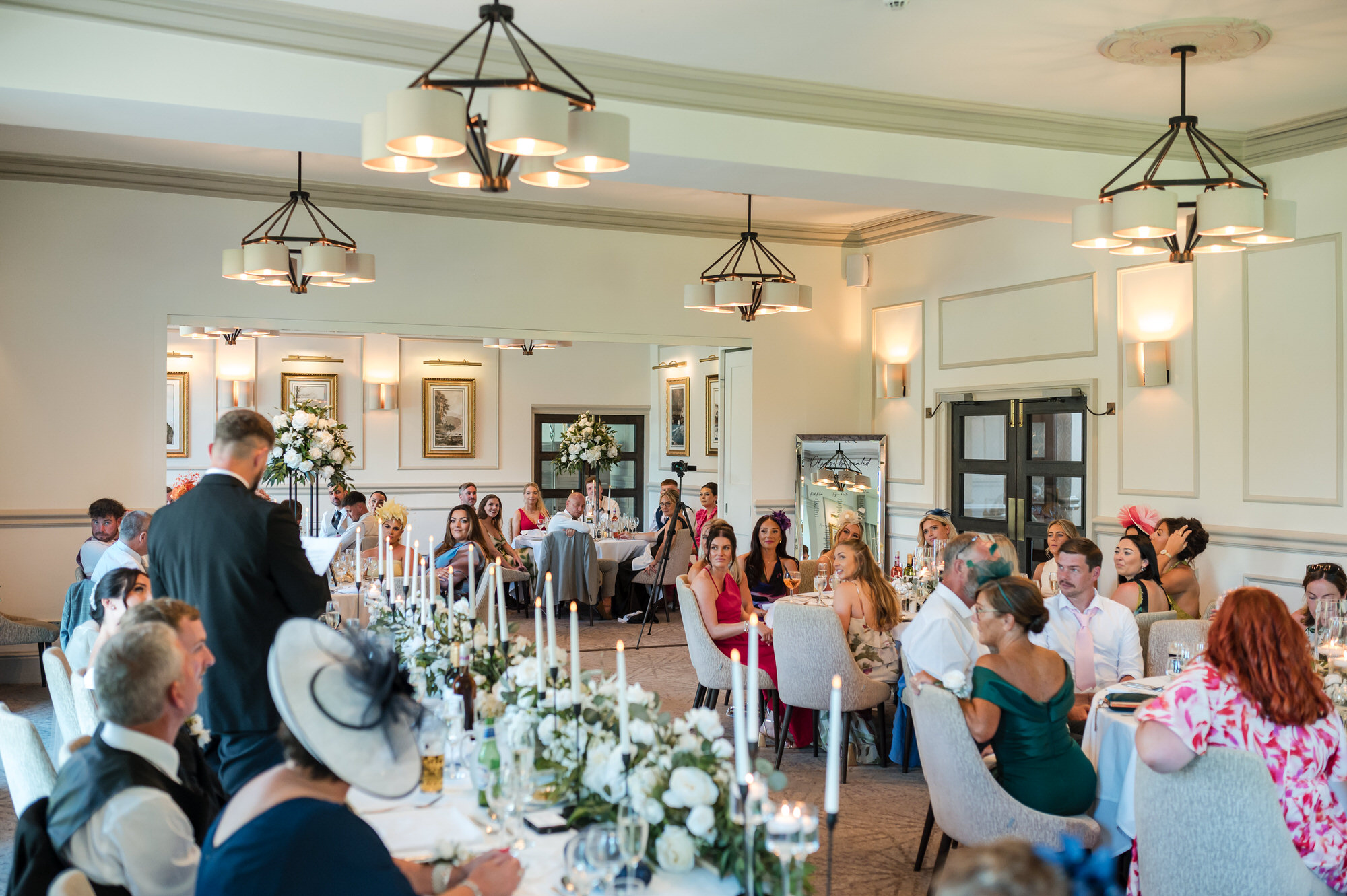 Guests listening and reacting during the wedding speeches