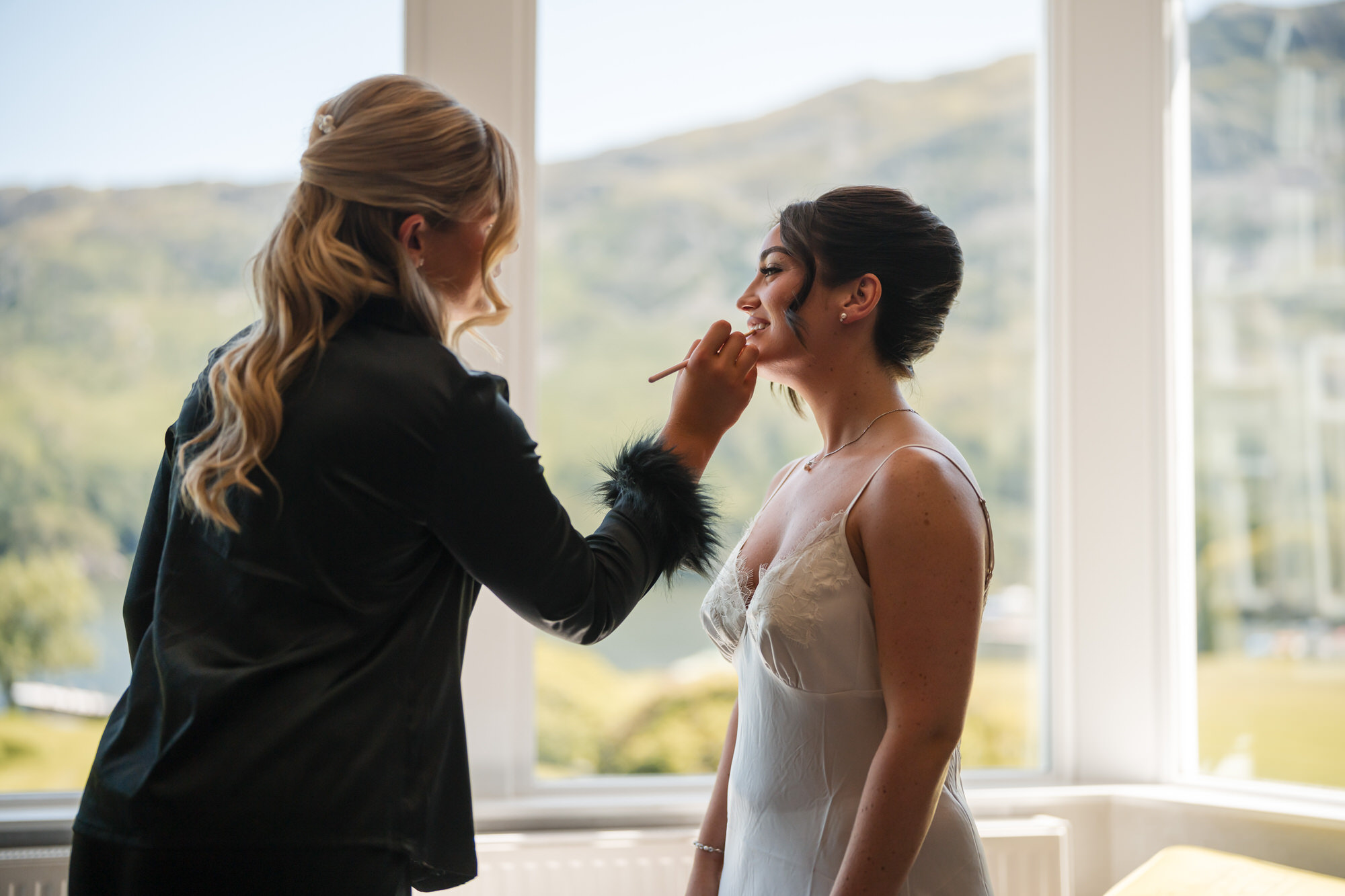 A candid moment with Amy and her bridal party before the ceremony