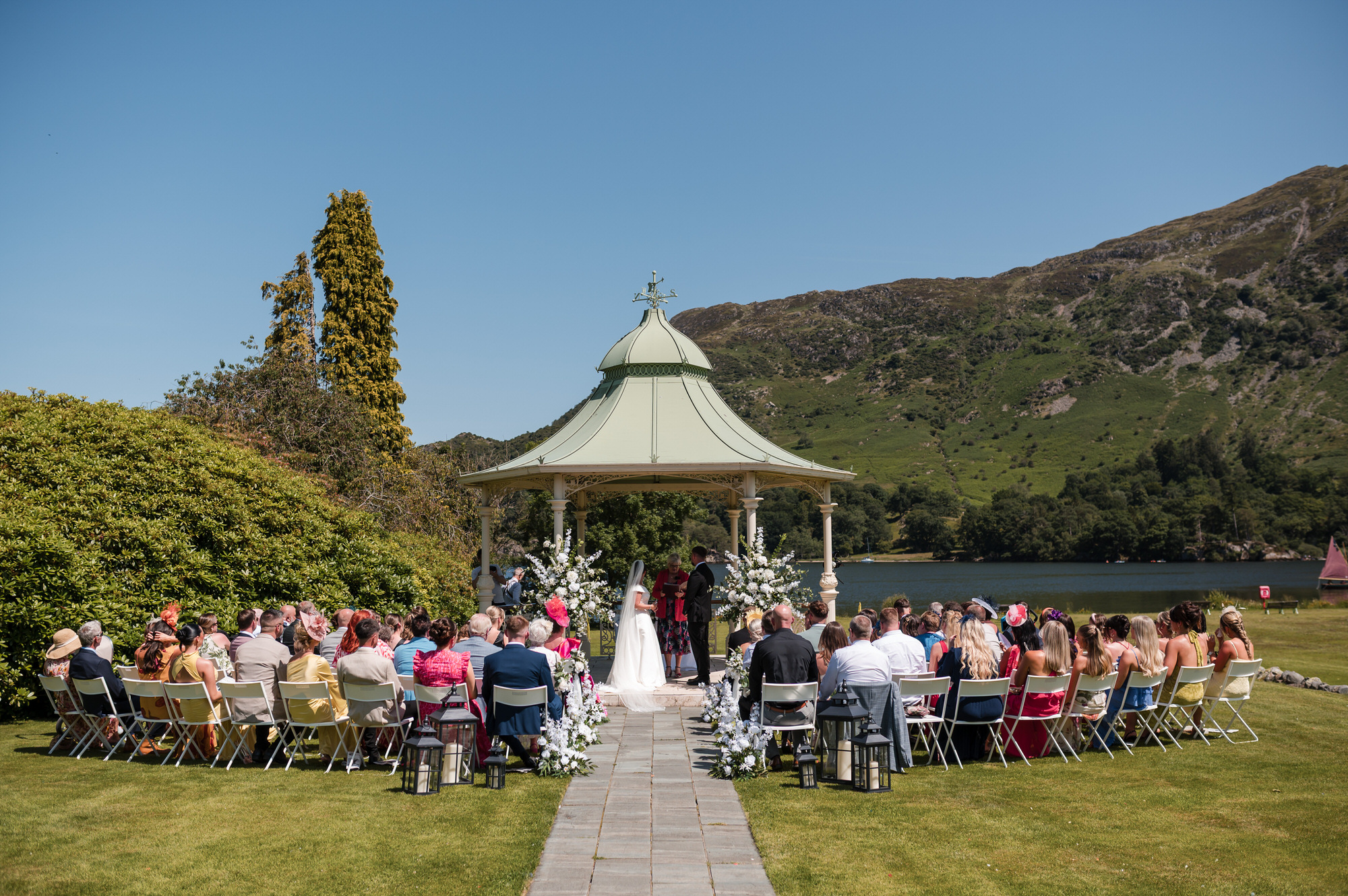 Nellie approaching the lakeside ceremony to deliver Dan and Amy's wedding rings