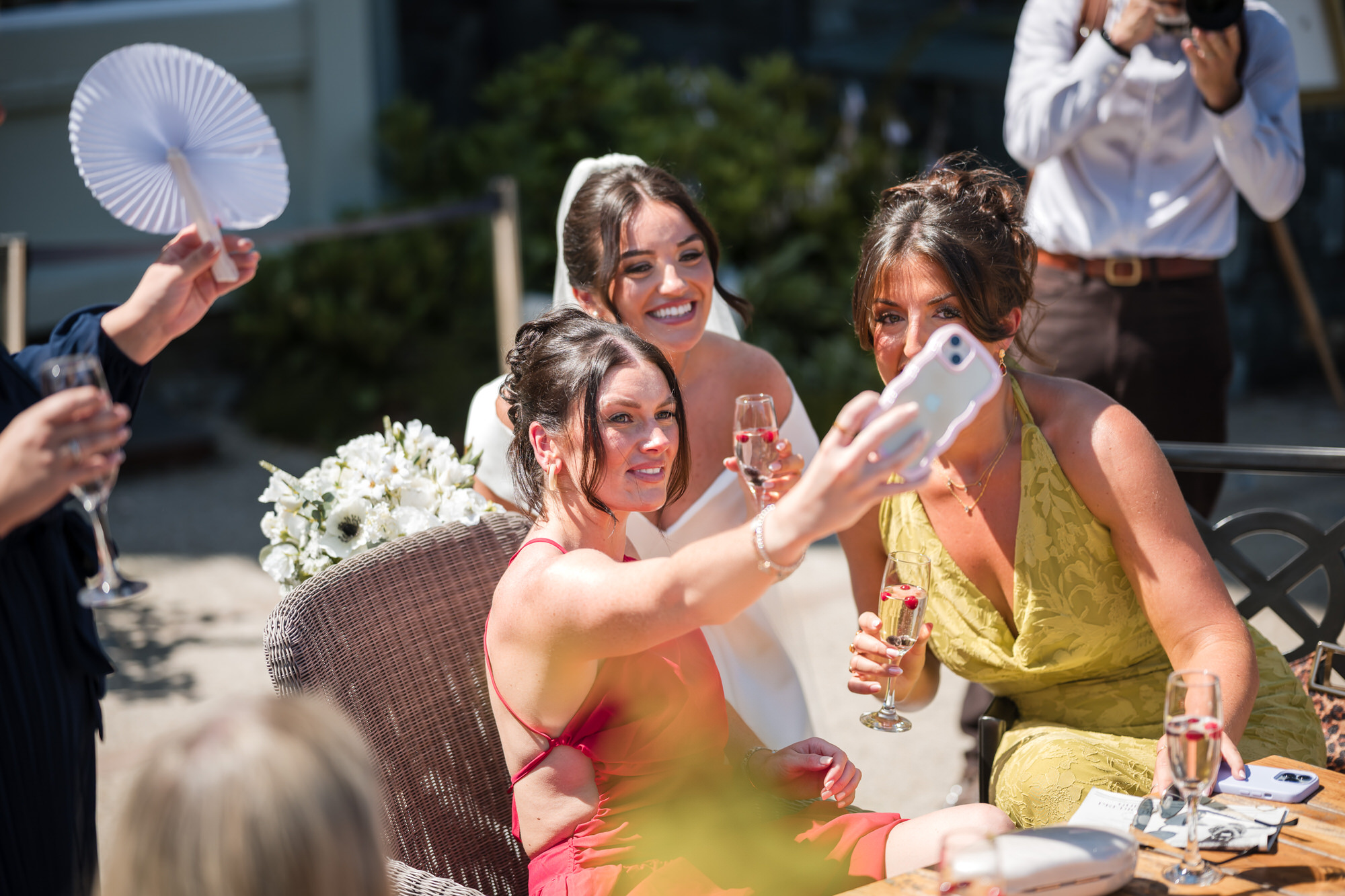 Dan and Amy celebrating with their bridesmaids and groomsmen