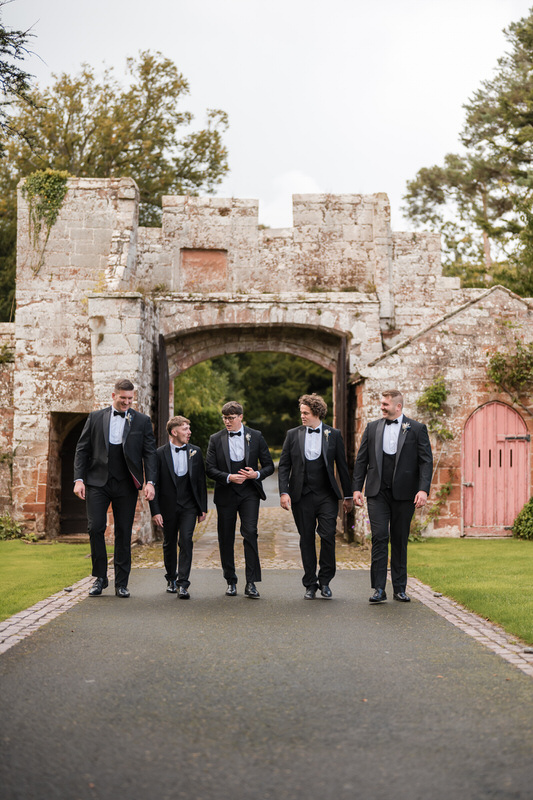 The groom party sharing a relaxed moment together