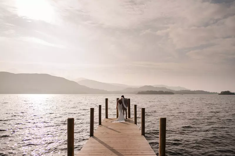 Wedding couple on the Derwentwater jetty near Lodore Falls Hotel