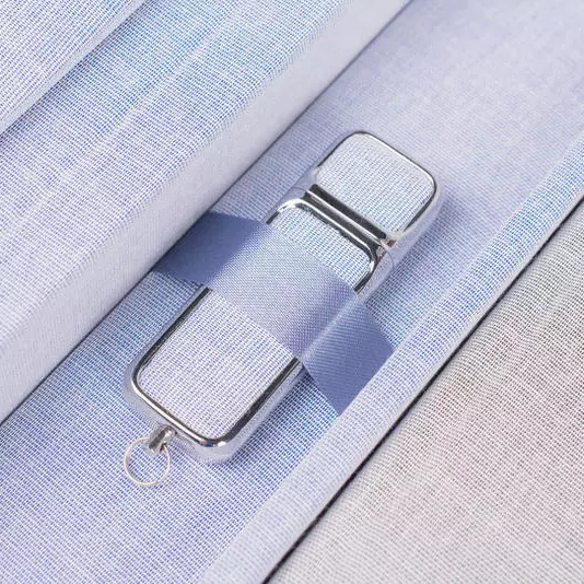 Wedding album open showing prints