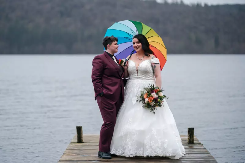 Lesbian wedding rain portrait at Broadoaks Country House