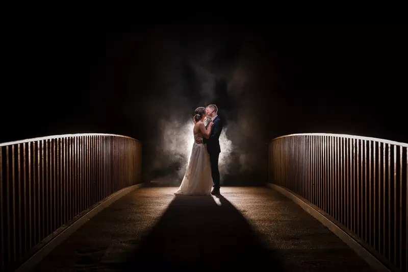 Lodore Falls night wedding bridge portrait Dramatic night wedding portrait on bridge at Lodore Falls with backlight and atmosphere