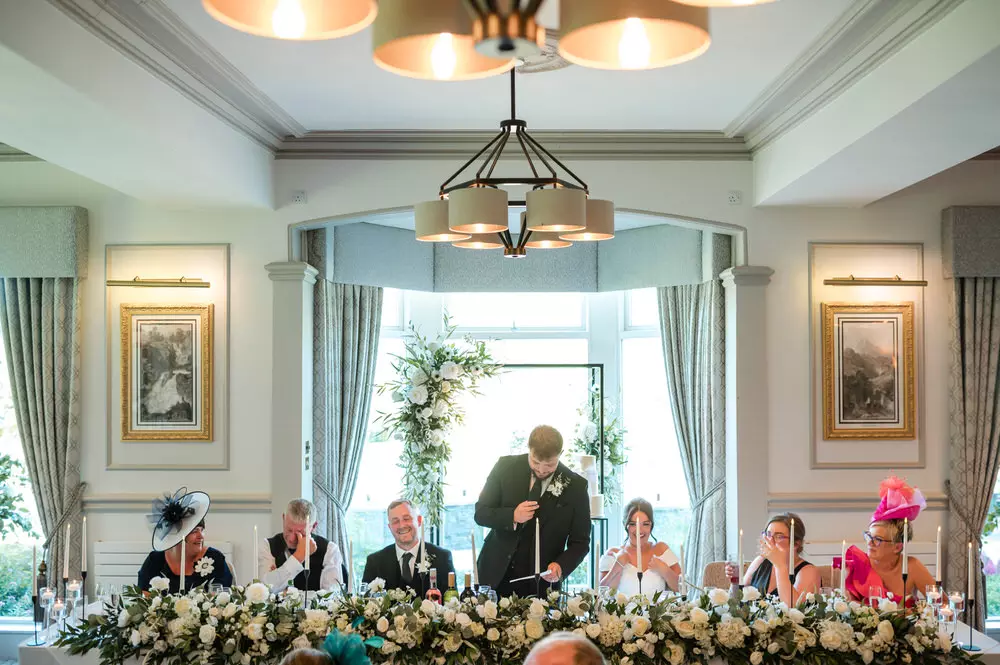 Speeches candid reactions at wedding breakfast