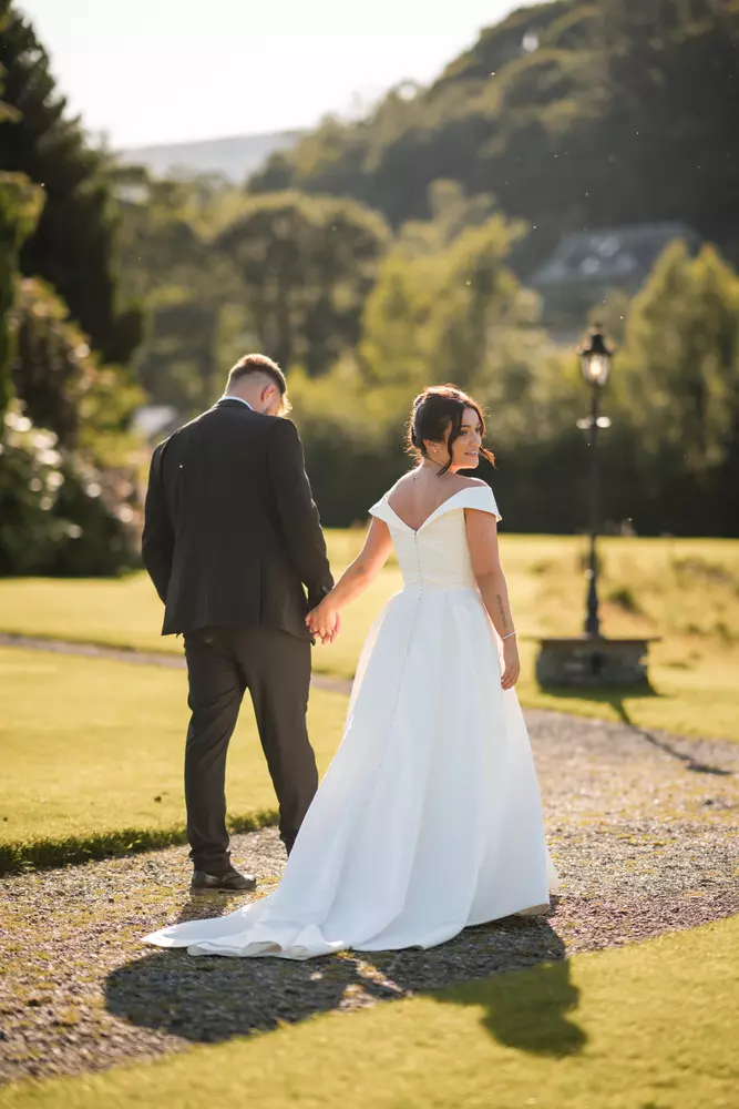 Couple walking together in soft evening light