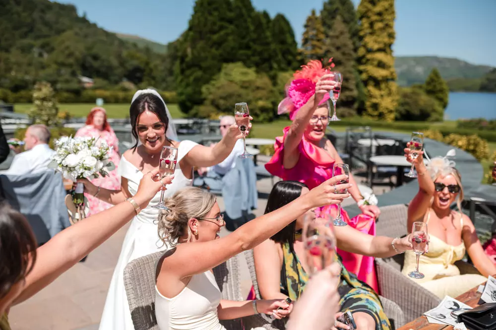 Drinks reception candid toasts and laughter