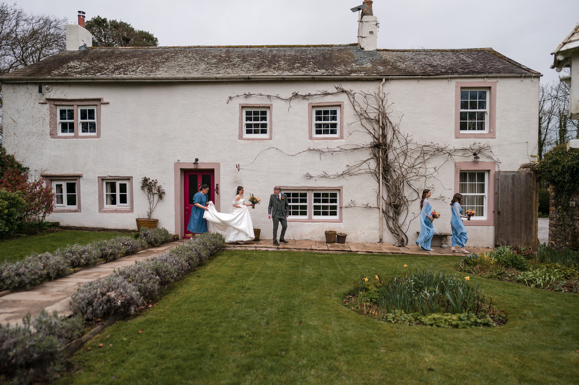 Bride arriving at Low Hall The Lakes wedding venue cottage