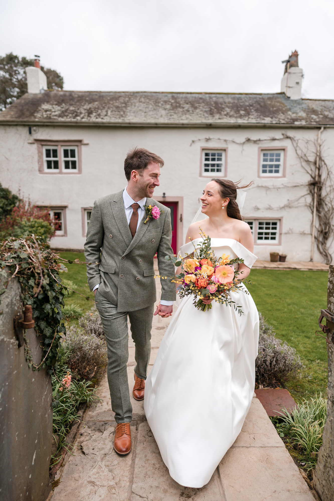Wedding couple portrait in the gardens at Low Hall The Lakes