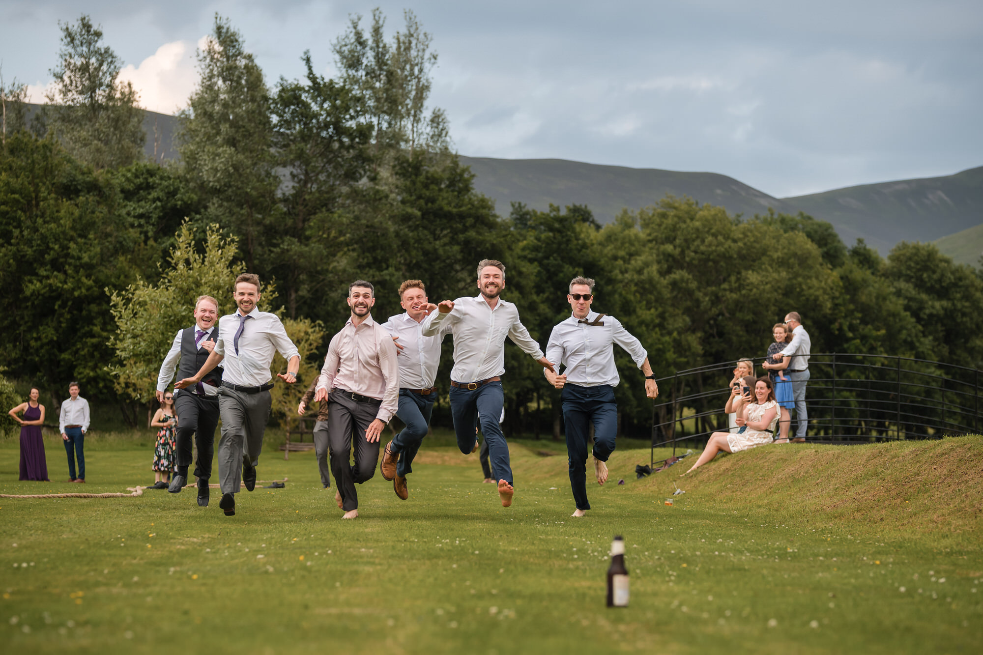 Wedding guests doing a beer run at New House Farm in the Lake District