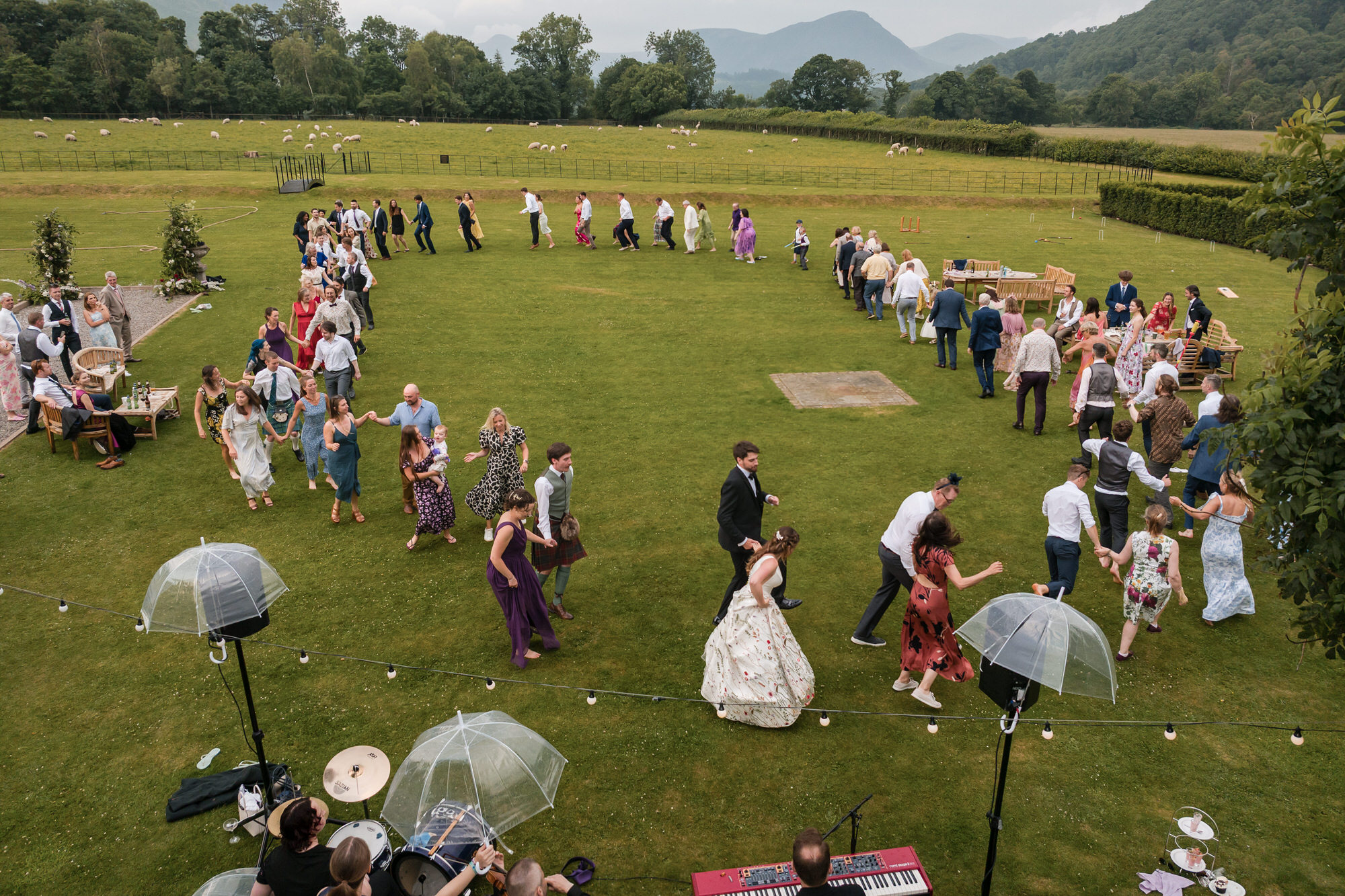 Wedding guests playing lawn games at New House Farm