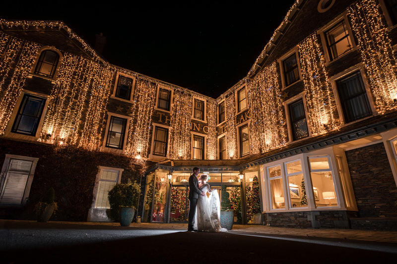 Inn on the Lake night wedding fairy light portrait Evening wedding portrait at Inn on the Lake with fairy lights glowing