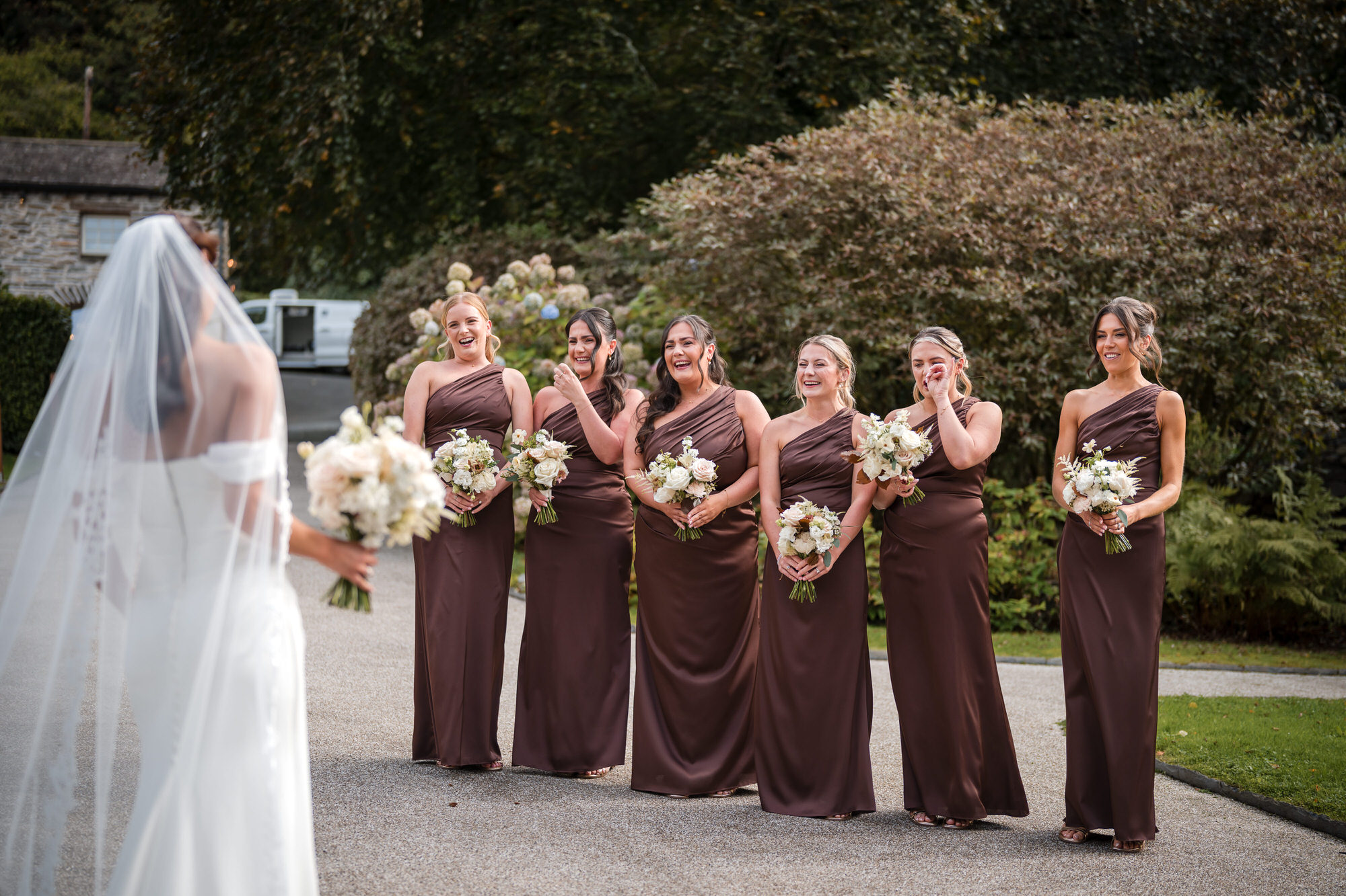 Ellie’s bridesmaids reacting to her wedding dress reveal