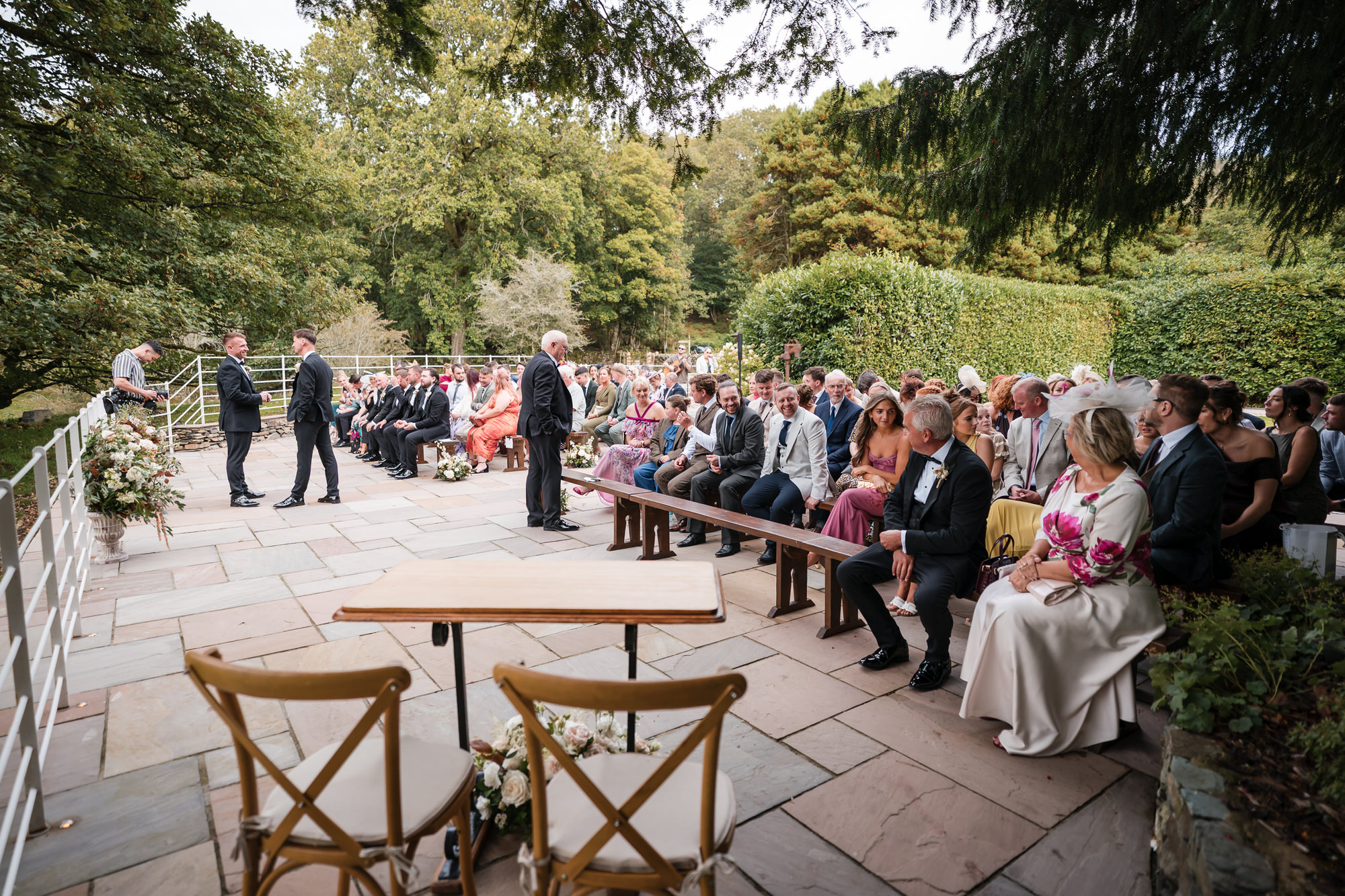 Guests seated for Dan and Ellie’s outdoor ceremony at Town Head Estate