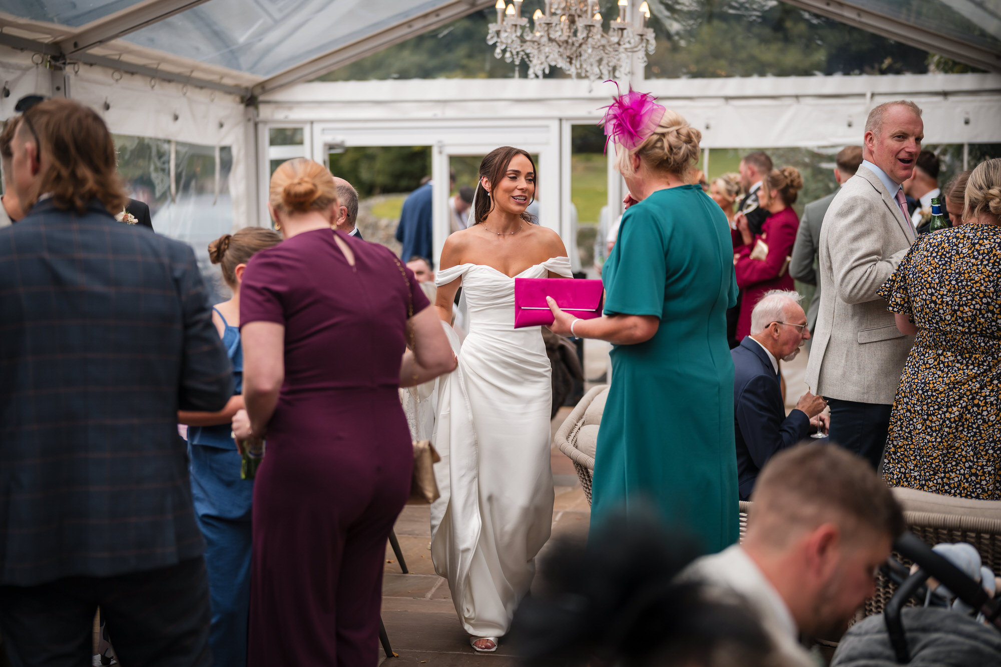 Ellie chatting with friends and family during the drinks reception