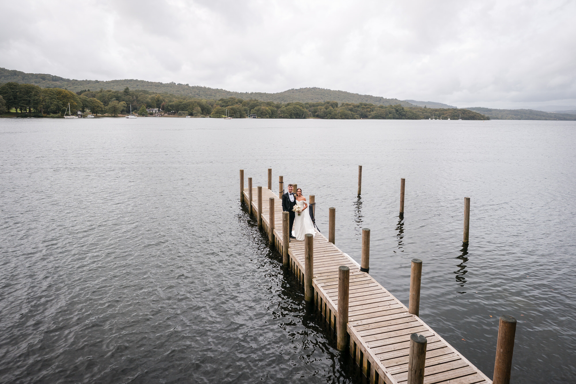 Wide view of Dan and Ellie together on the jetty overlooking Windermere