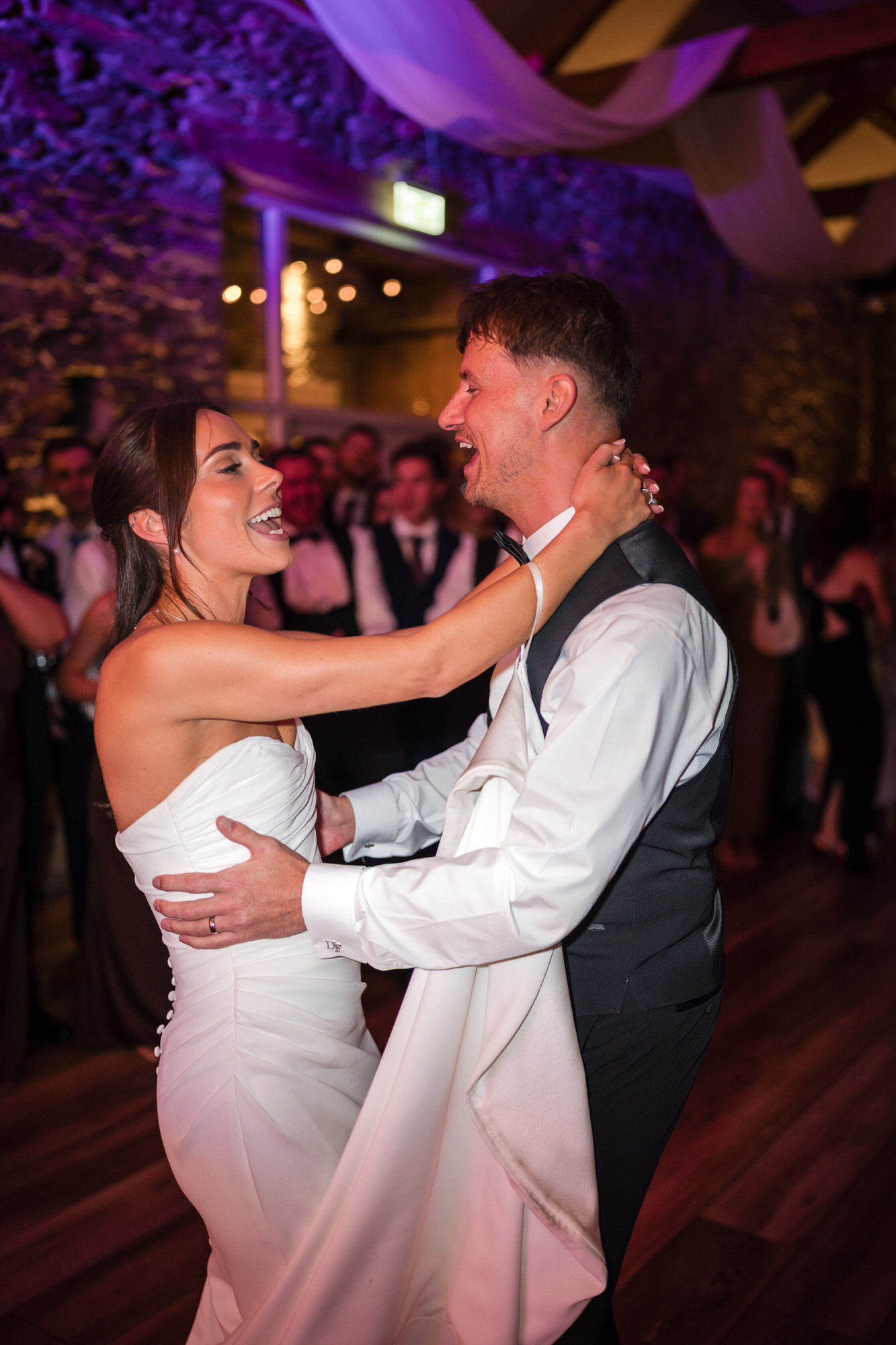 Dan and Ellie sharing a kiss during their first dance